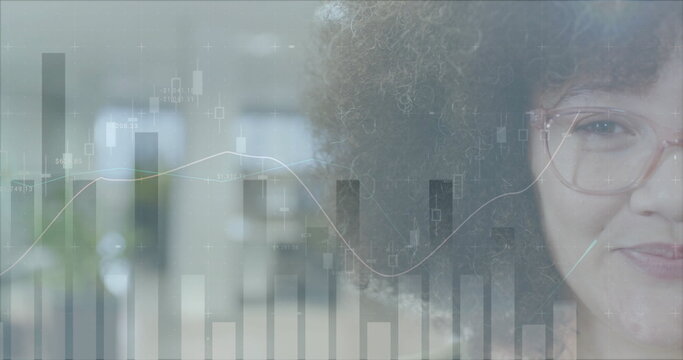 Image of financial data processing over smiling biracial businesswoman in office