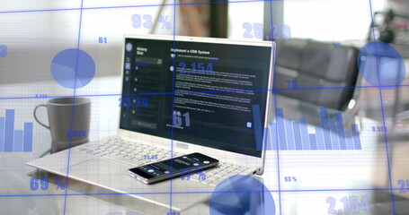 Image of statistics and data processing over computer on desk in office