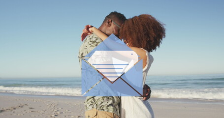 Image of email envelope digital icon over couple in love hugging on beach