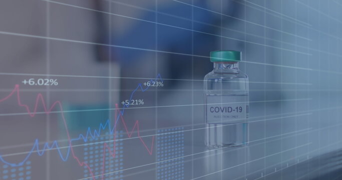 Image of digital interface showing statistics with covid-19 vaccine standing on table