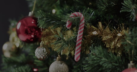 Fototapeta premium A Christmas tree adorned with festive decorations