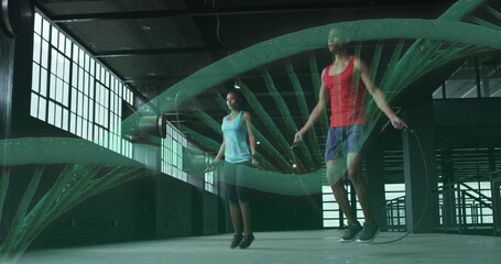 Image of dna strain spinning over man and woman woman jumping rope