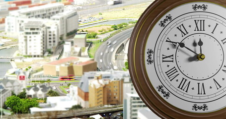 Image of clock ticking over cityscape