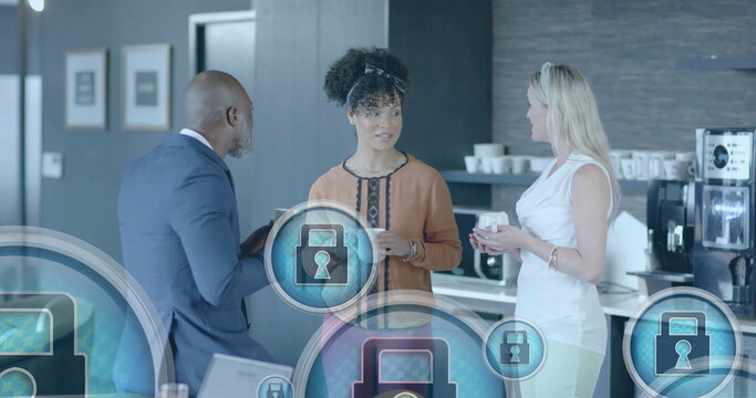 Image of padlock icons processing over diverse business people in office - Powered by Adobe