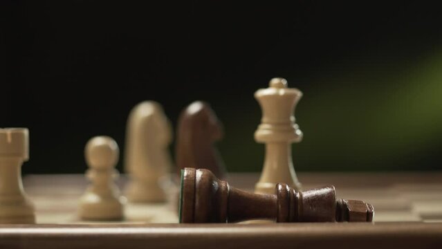 Detail of chess pieces during professional game checkmate