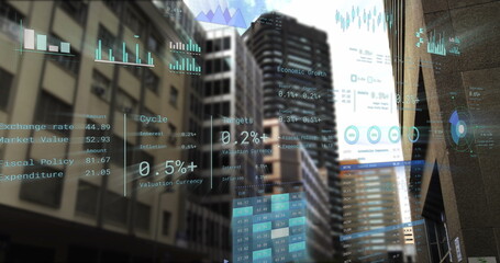 Image of financial data processing over cityscape