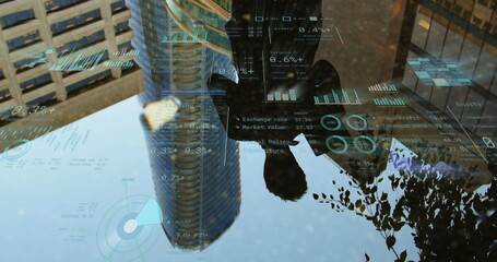 Image of financial data processing over man and cityscape