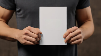 Man's hands holding blank book mockup