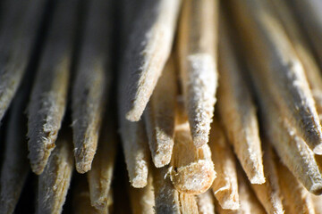 Macro photo of a bunch of toothpick sticks