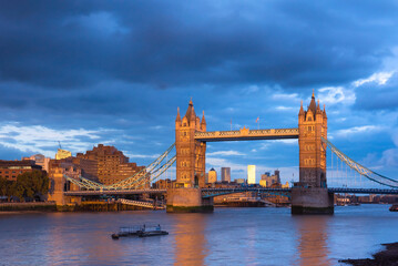 Tower Bridge in London at sunset. This is one of the oldest bridges and landmarks and a popular tourist attraction.