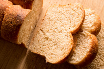 Sliced white Bread on the bamboo desk background, homemade bakery concept