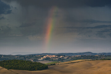 Naklejka na ściany i meble Pitoresque region Tuscany, rainbow over the valley, Italy.