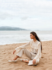 Summer Beauty: Attractive Woman Enjoying Freedom on a Sunny Beach