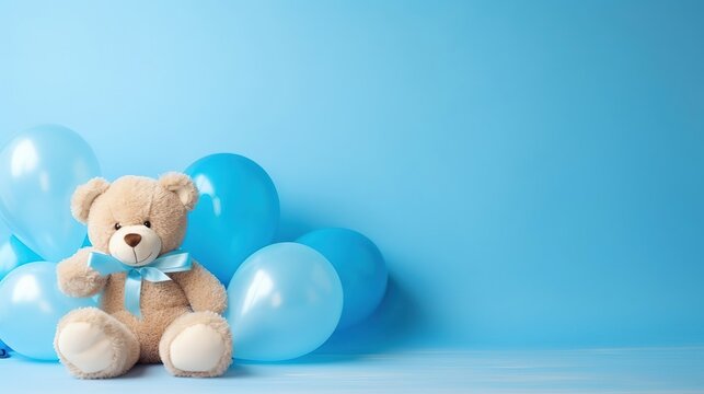 Blue balloons and a teddy bear on a blue background, a birthday and holiday concept, a birthday card for a child