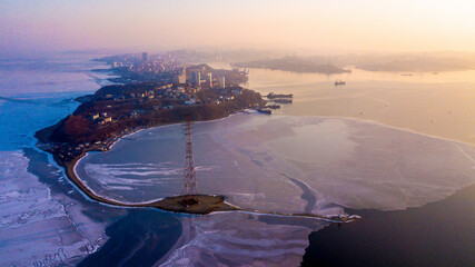 View from above. Winter Vladivostok. Cape Egersheld at dawn.