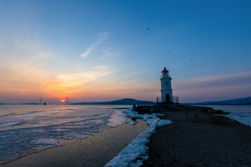 Winter Vladivostok. Tokarevsky lighthouse at dawn.