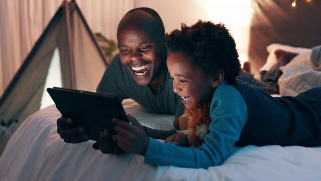 Happy father, child and tablet at night on bed for online streaming, entertainment or watching movie at home. African dad, kid or son smile with technology for movie, funny show or cartoon in bedroom