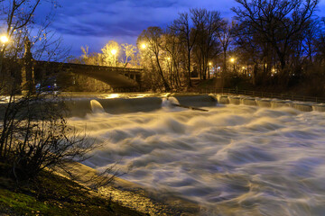 Munich, Germany - 12.13.2023: Fish ladder in munich after heavy rainfall and snowmelt in winter