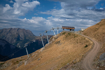 Mountain landscape with a ski lift in summer in the resort of Alpe d'Huez in France
