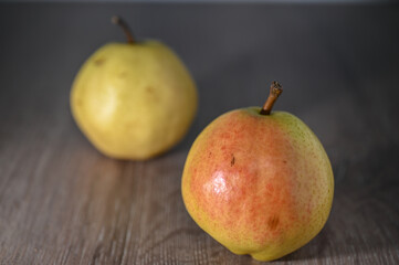 two juicy pears on a wooden table, studio shooting 3