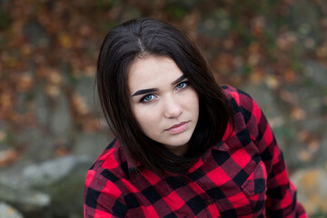 Beautiful girl with shiny black hair and black eyes. Miss from Ukraine