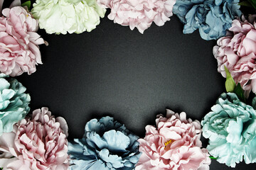 Colorful Flower frame with space for copy on black background