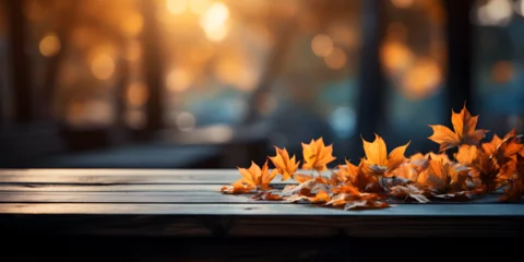 Zelfklevend Fotobehang fallen leaves on wooden bench in park © arte ador