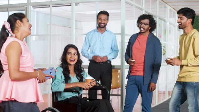 Group of diverse Team members at office spending time together during leisure - concept of refreshment, employee interaction and socializing