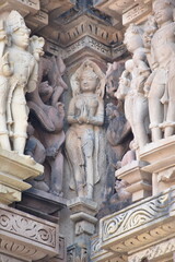 This is photo of temple at Khajuraho in India. It is example of finest art in the world. 