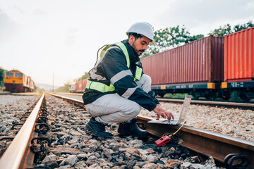 Engineer wearing safety uniform sitting on railway inspection. construction worker on railways. Engineer working on Railway. Rail, engineer, Infrastructure.