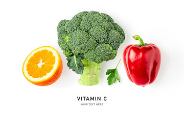 Broccoli, red pepper, parsley and orange isolated on white background.