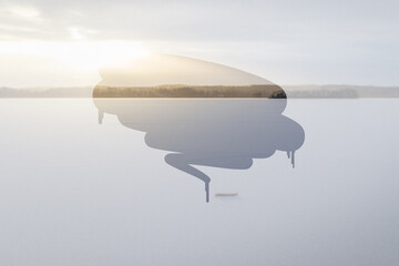 Frozen and snowy lake in Finland in the winter on a sunny day. Frosty glass effect with partly...