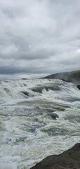 gullfoss waterfall in iceland on a cloudy day