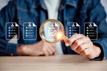 Businessman use magnifying glass focus to human icons for customer focus group. Data exchanges development and customer service , Customer relationship management concept. - obrazy, fototapety, plakaty