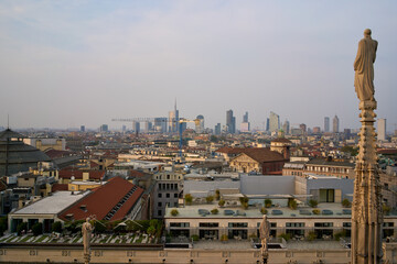 Rooftop cityscape over Milan at dusk, Milan, Italy