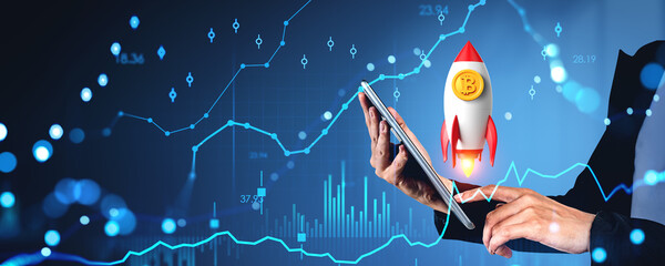 Businesswoman hands with tablet, forex graph and flying rocket with bitcoin