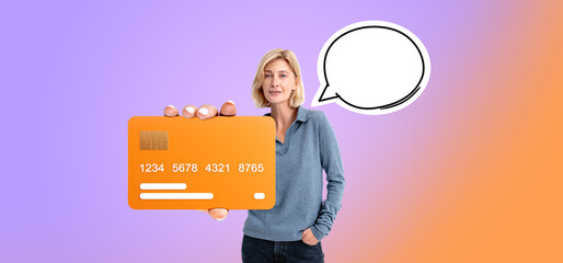 Blonde woman holding mock up credit card, empy speech bubble