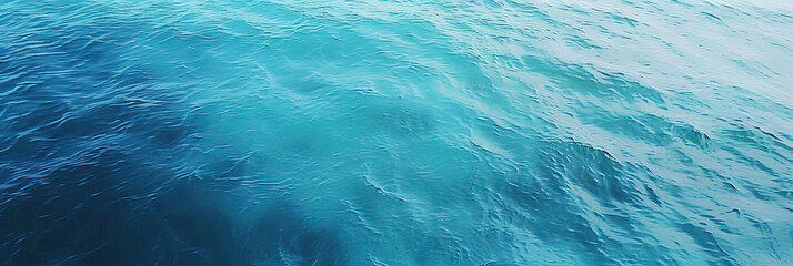 Obraz premium aerial view of the ocean surface, Calm blue waters seen from above 