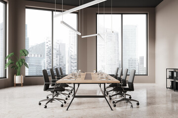 Modern office room interior with meeting table and armchairs, panoramic window