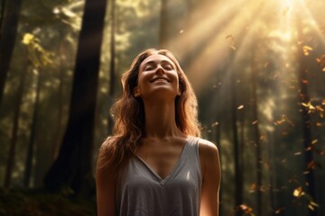 Happy woman enjoying fresh air in nature.