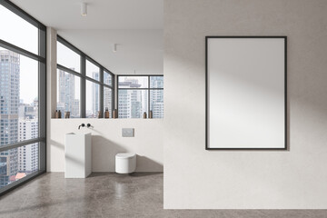 Obraz premium White bathroom interior with sink, toilet and poster