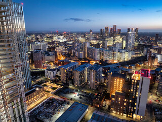 Fototapeta na wymiar Aerial image of Manchester cityscape at dusk showing new urban developments
