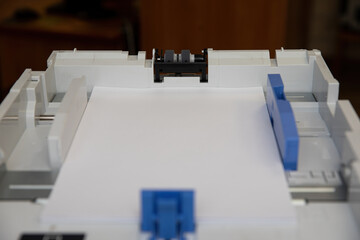 The printer's paper feed tray.