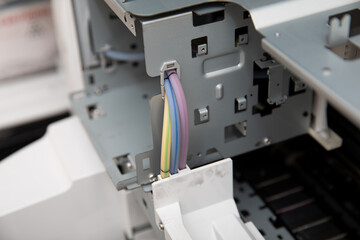 Wires, parts and mechanisms of an ink tube of an inkjet printer.
