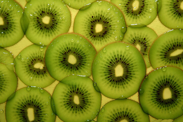 a lot of kiwi slices as textured background
