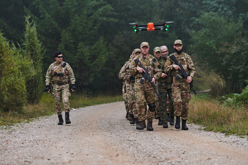 An elite military unit, led by a major, confidently parades through dense forest, showcasing...
