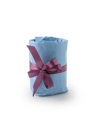 Present wrapped with blue paper with purple ribbon bow isolated on white background