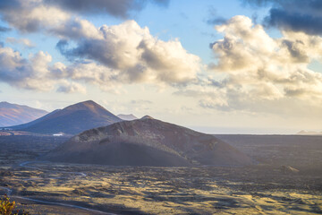 Fototapeta premium Volcan del cuervo and lava in Lanzarote, Canary Island, Spain