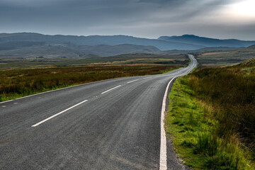 Abandoned Road Through Spectacular Rural Landscape Of Snowdonia National Park In North Wales, United Kingdon