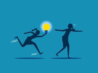 Businessman passes light bulb to running colleague